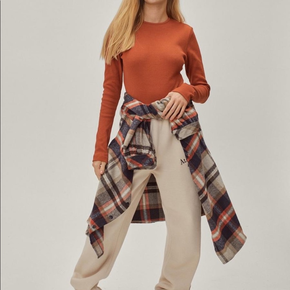 NWOT Free People Burnt Orange long sleeve bodysuit
